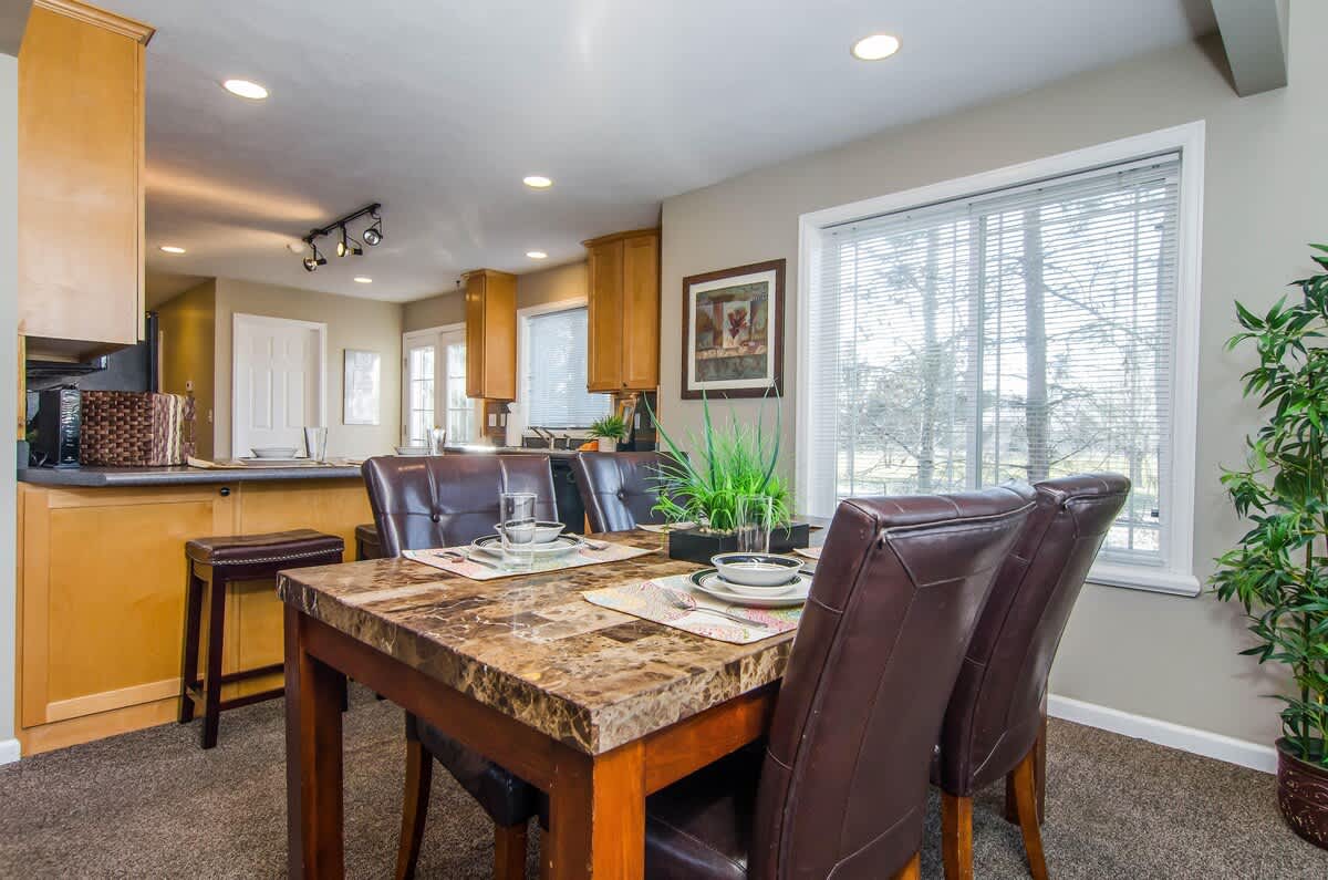 House 3 dining table for 4 and kitchen with bar seating