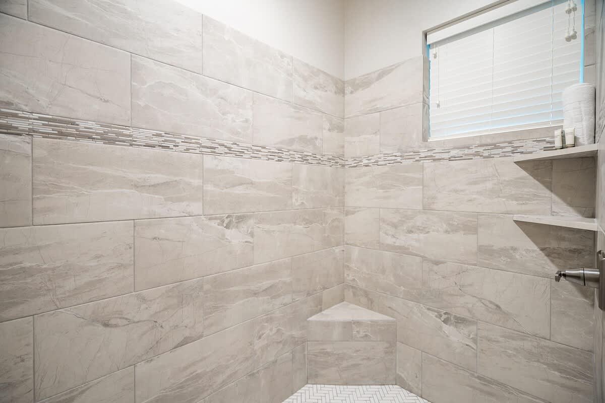 Large stone shower in master bathroom