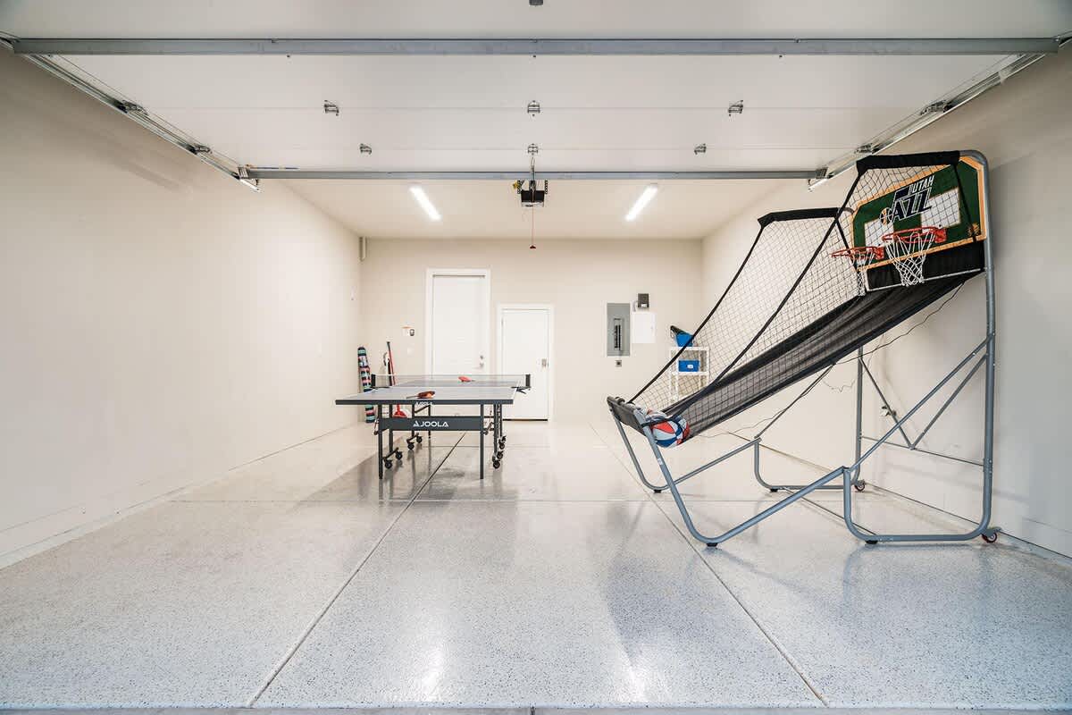 Garage doubles as game room with ping ping and basketball arcade