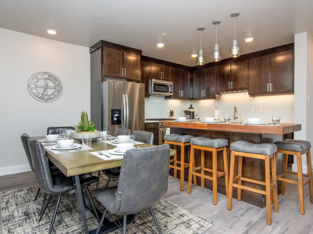 Dining area seats 8 open to adjoining kitchen