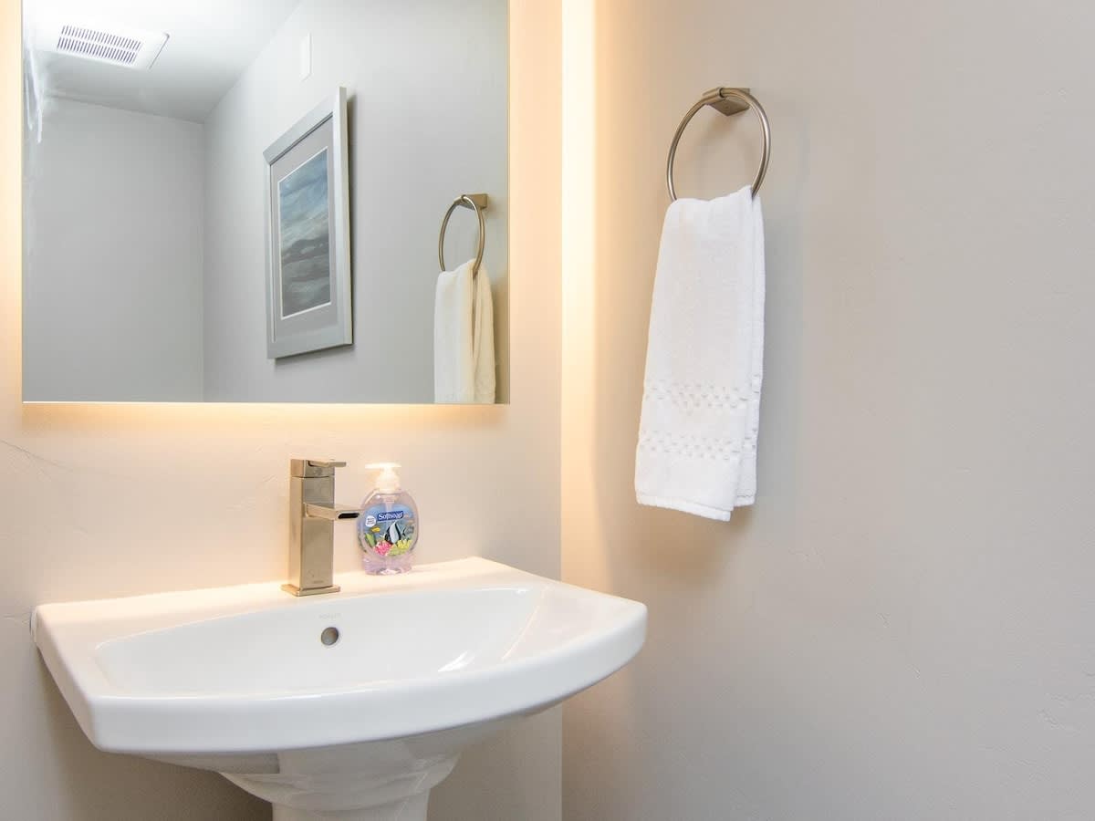 Half bathroom with pedestal sink