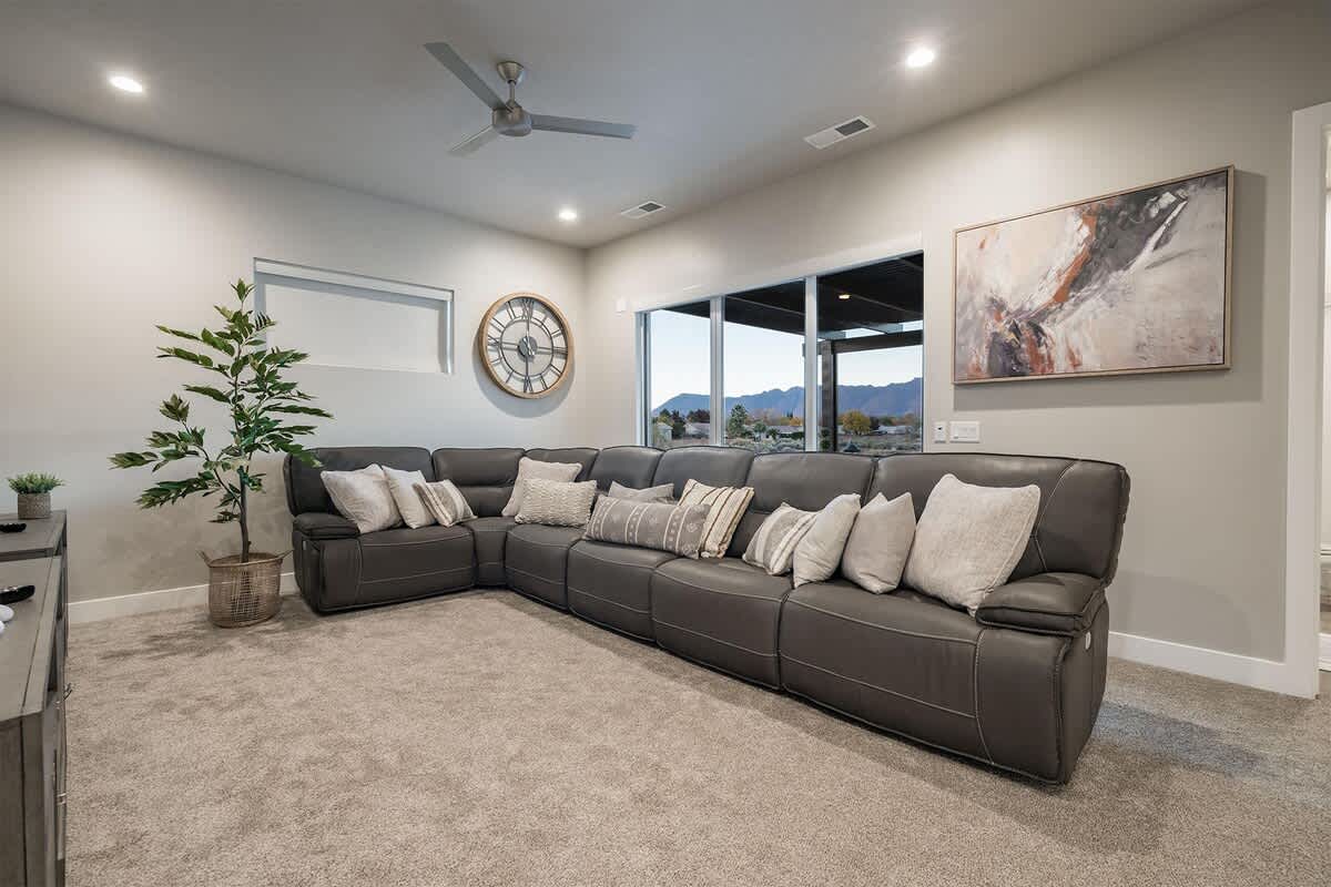 Family room sectional and balcony patio with stunning view