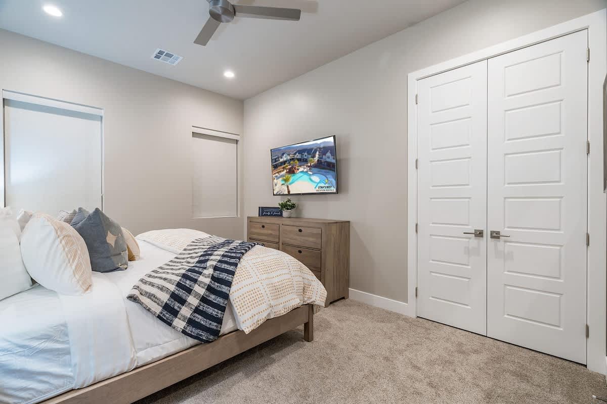 Bedroom 2 with king bed and TV