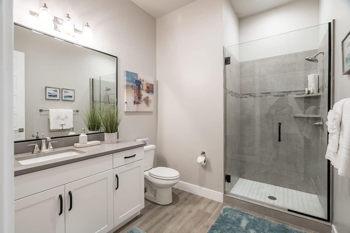 Bathroom in bedroom 2 with nice stone shower and sink