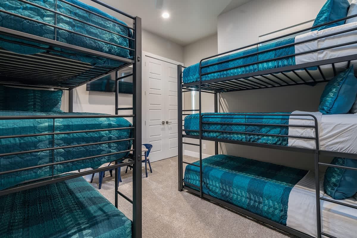 Bedroom 3 with two triple twin bunk beds sleeps 6