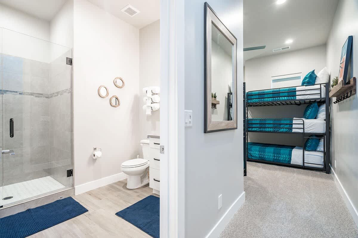 Bedroom 3 with private bathroom and 6 twin beds