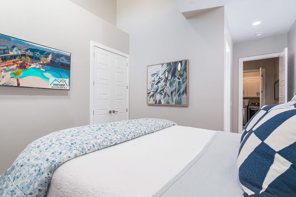 Master suite with king bed and TV