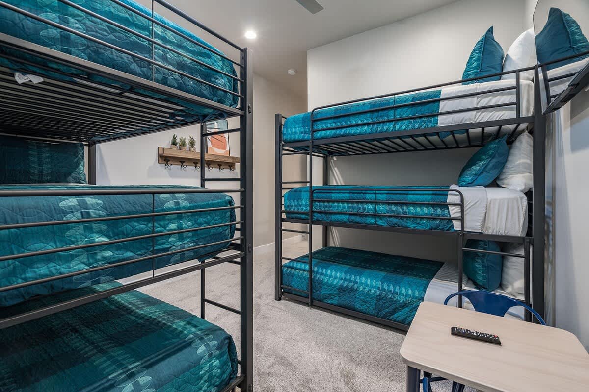 Bedroom 3 with two triple twin bunk beds sleeps 6