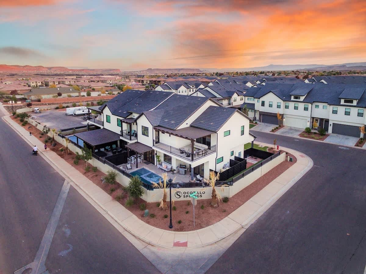 Aerial view of back of both homes and main Ocotillo entrance