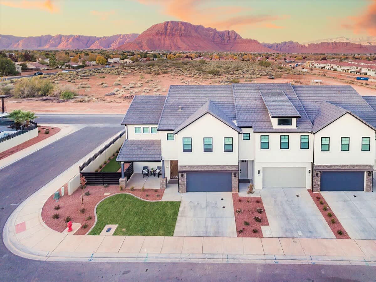 Connecting homes with open backyard pool and 2 spas