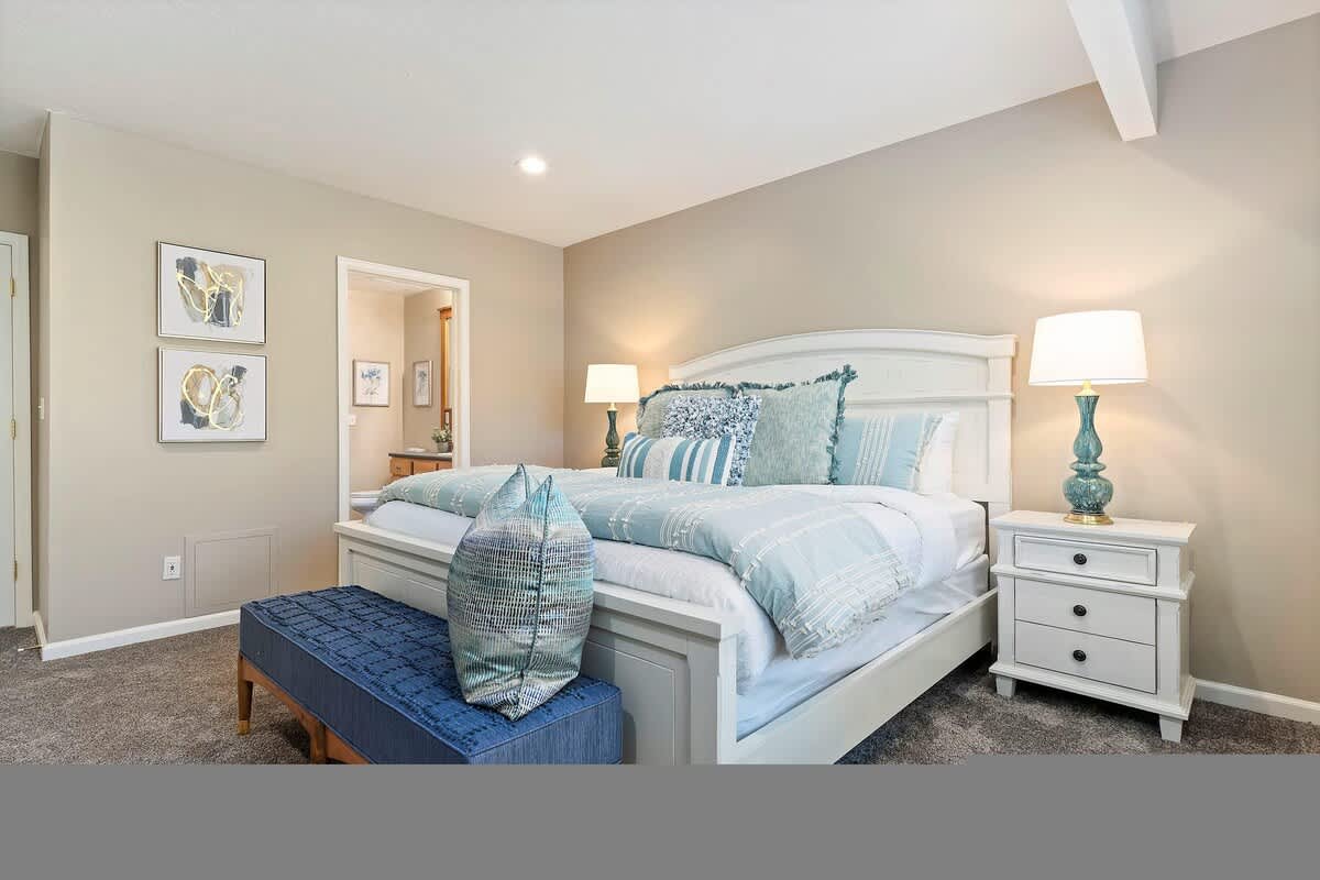 Master bedroom with luxury linens and designer touches