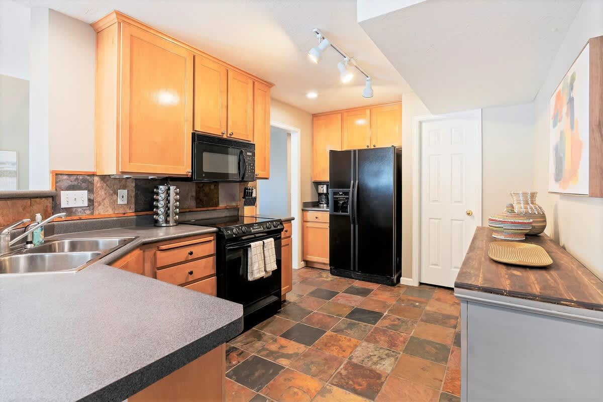 Prepare and enjoy meals together in fully-stocked kitchen