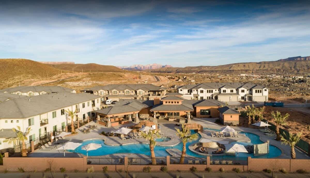 Aerial view of the community pool, lazy river and clubhouse