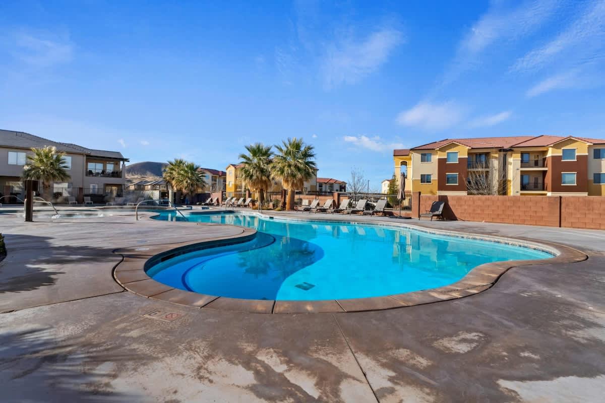 Community pool with nice lounging area