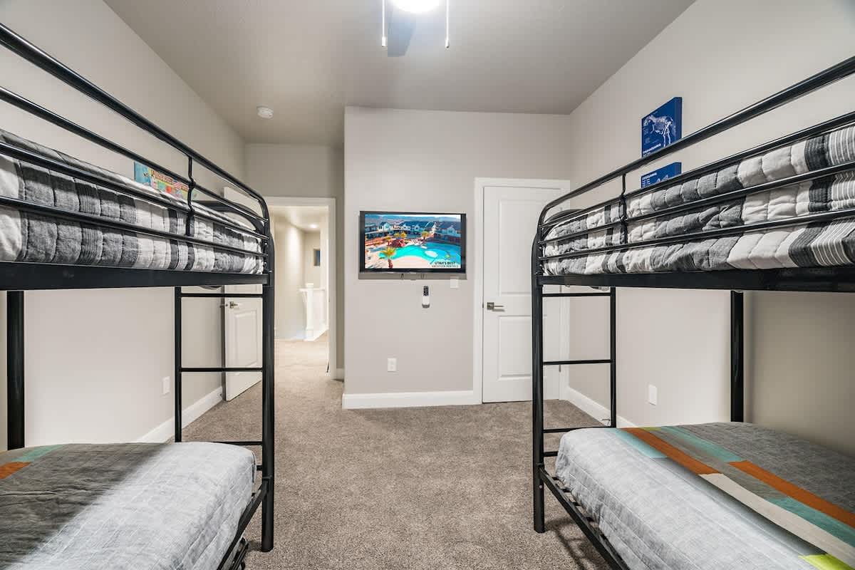 Bedroom 3 has a small TV