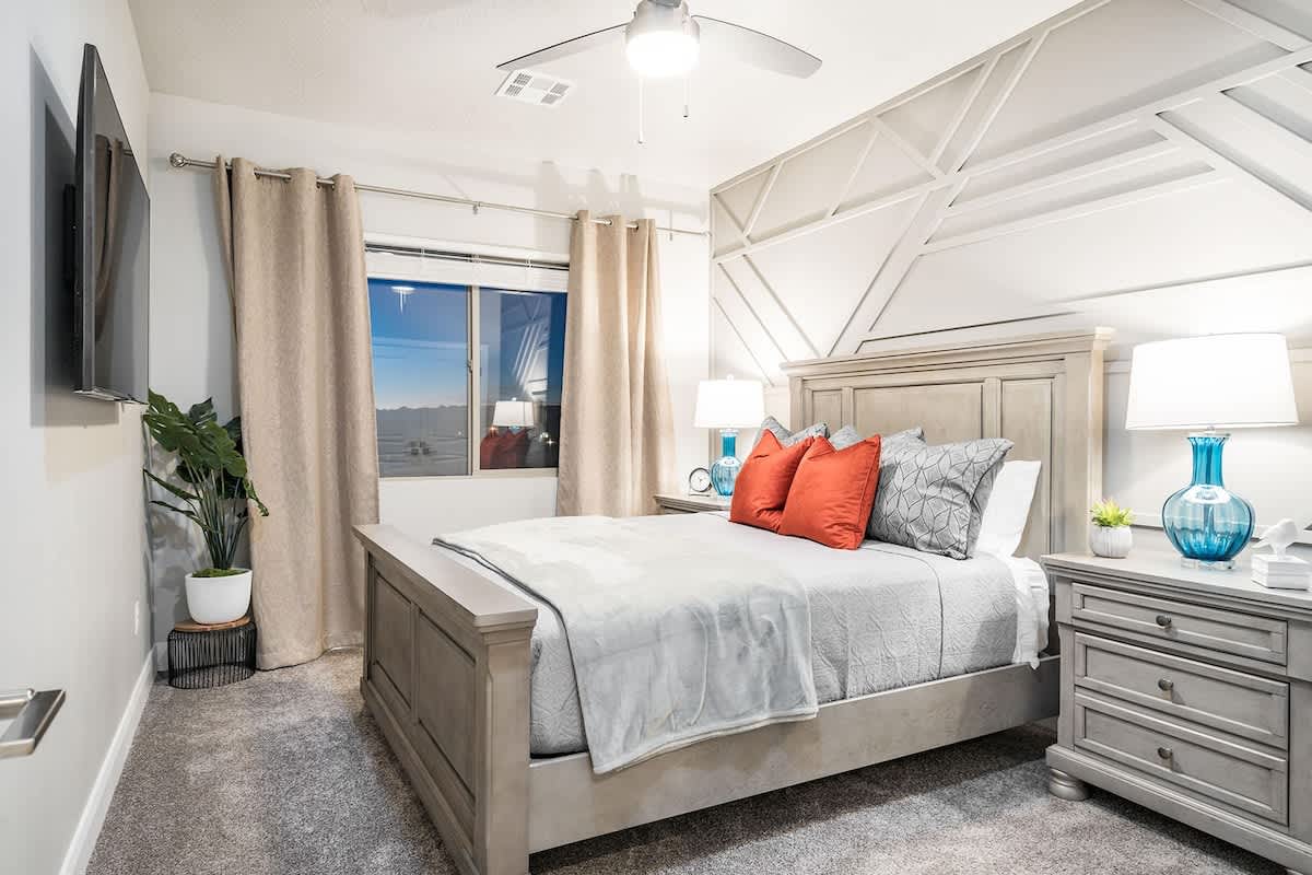 Bedroom 2 with queen bed and beautiful accent wall