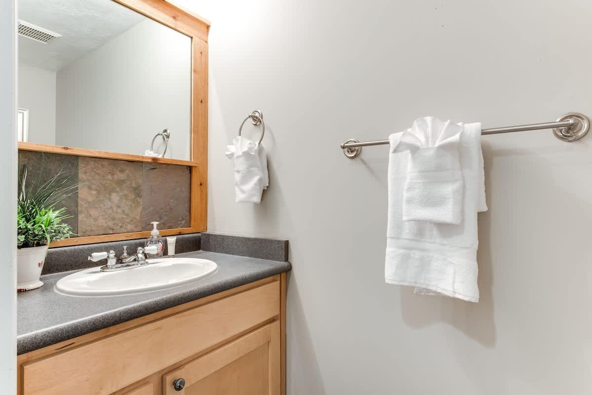 Half bathroom off kitchen in Union Grove home