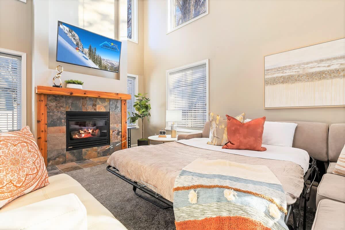 Family room with sofa sleeper in Union Crossroads home