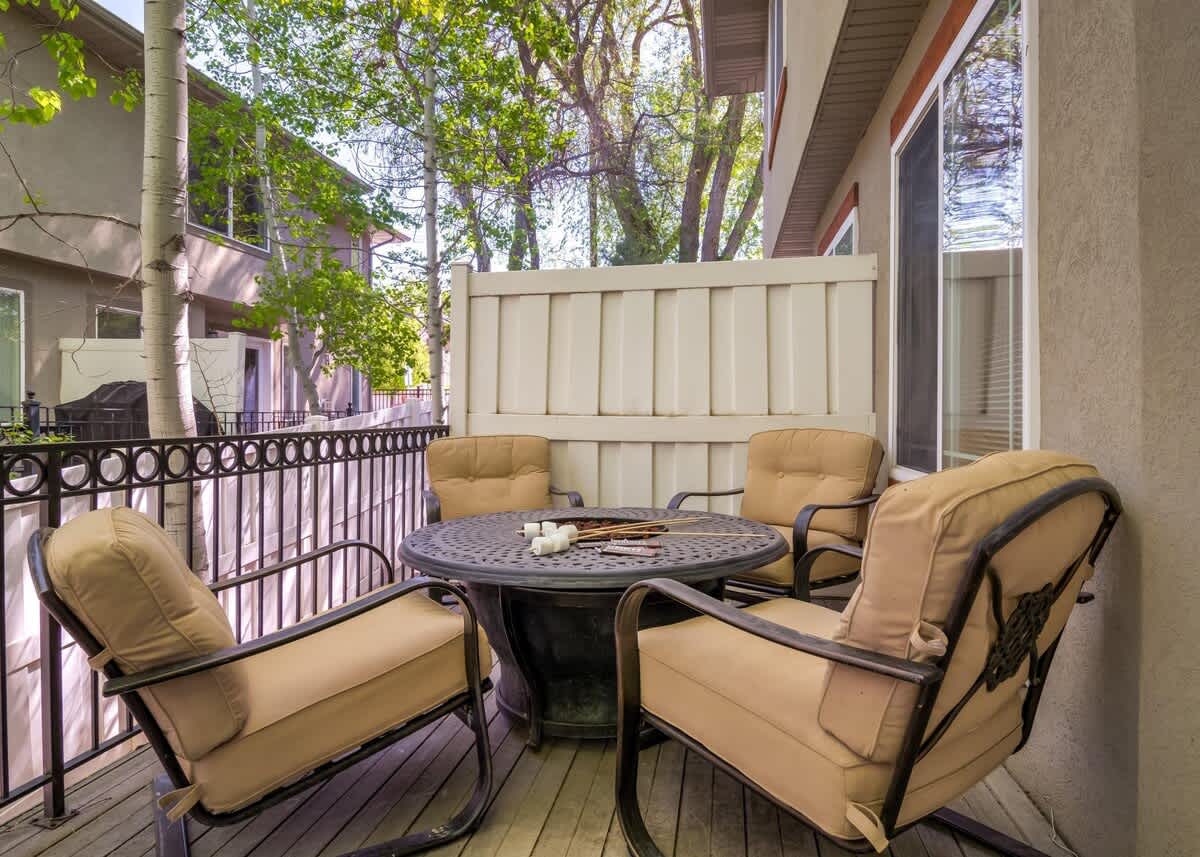 Cushioned patio chairs on patio of Union Gateway