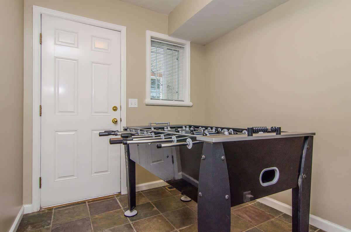 Foosball table on main level in Union Cove home