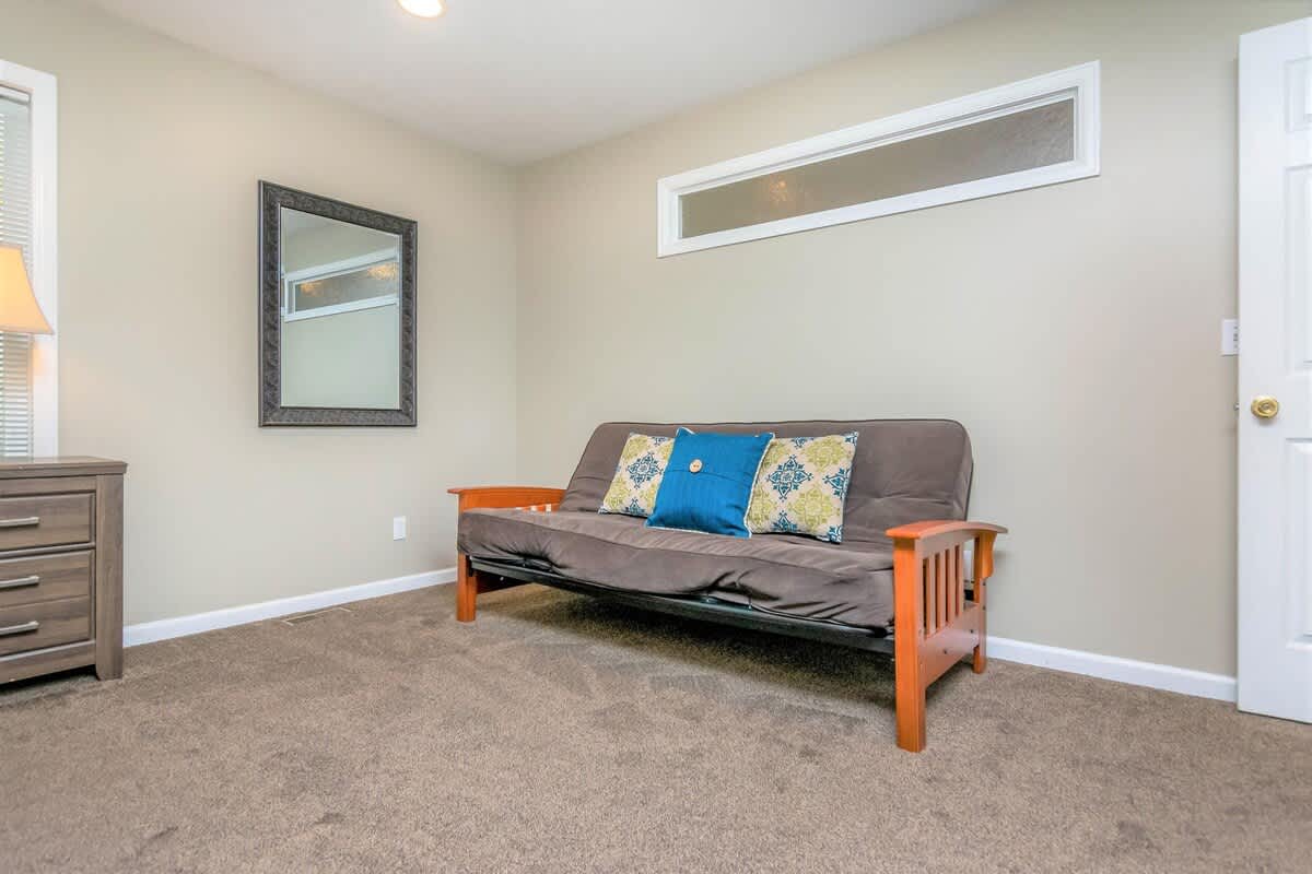 Master bedroom futon in Union Spruces home