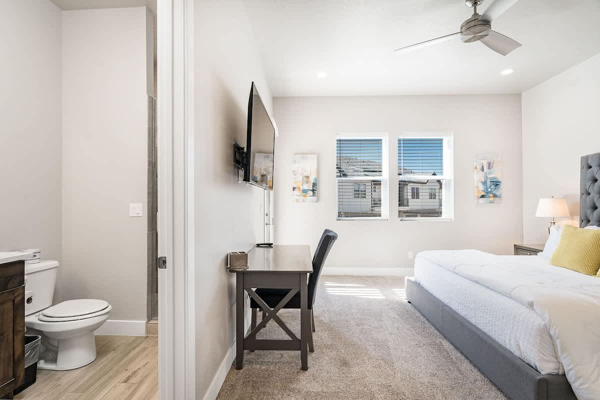 Bedroom 3 with king bed and private bathroom