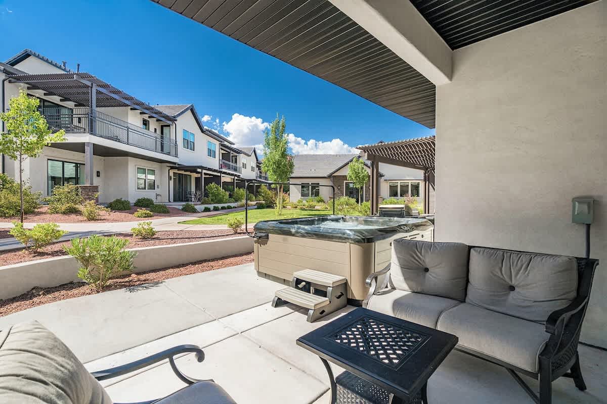 Covered patio and private hot tub