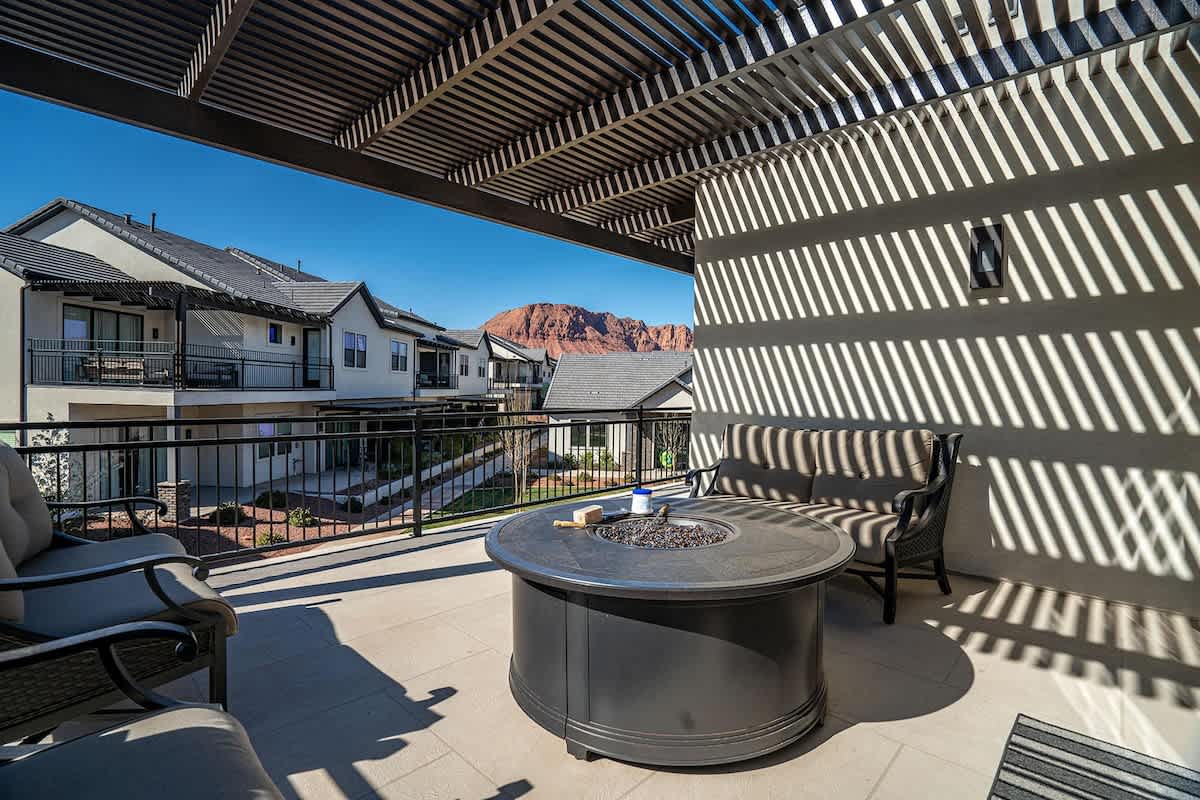 Relax on your own private balcony with fire pit and amazing view