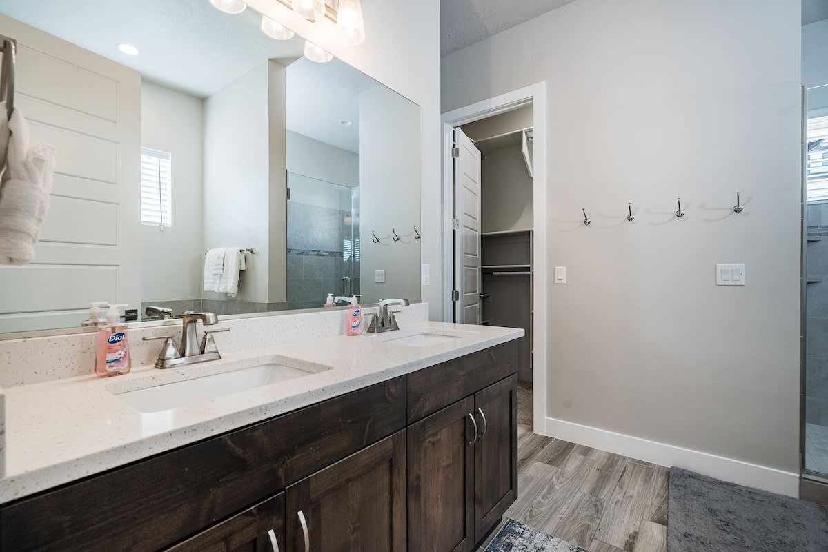 Master bathroom with dual sinks, tub and shower