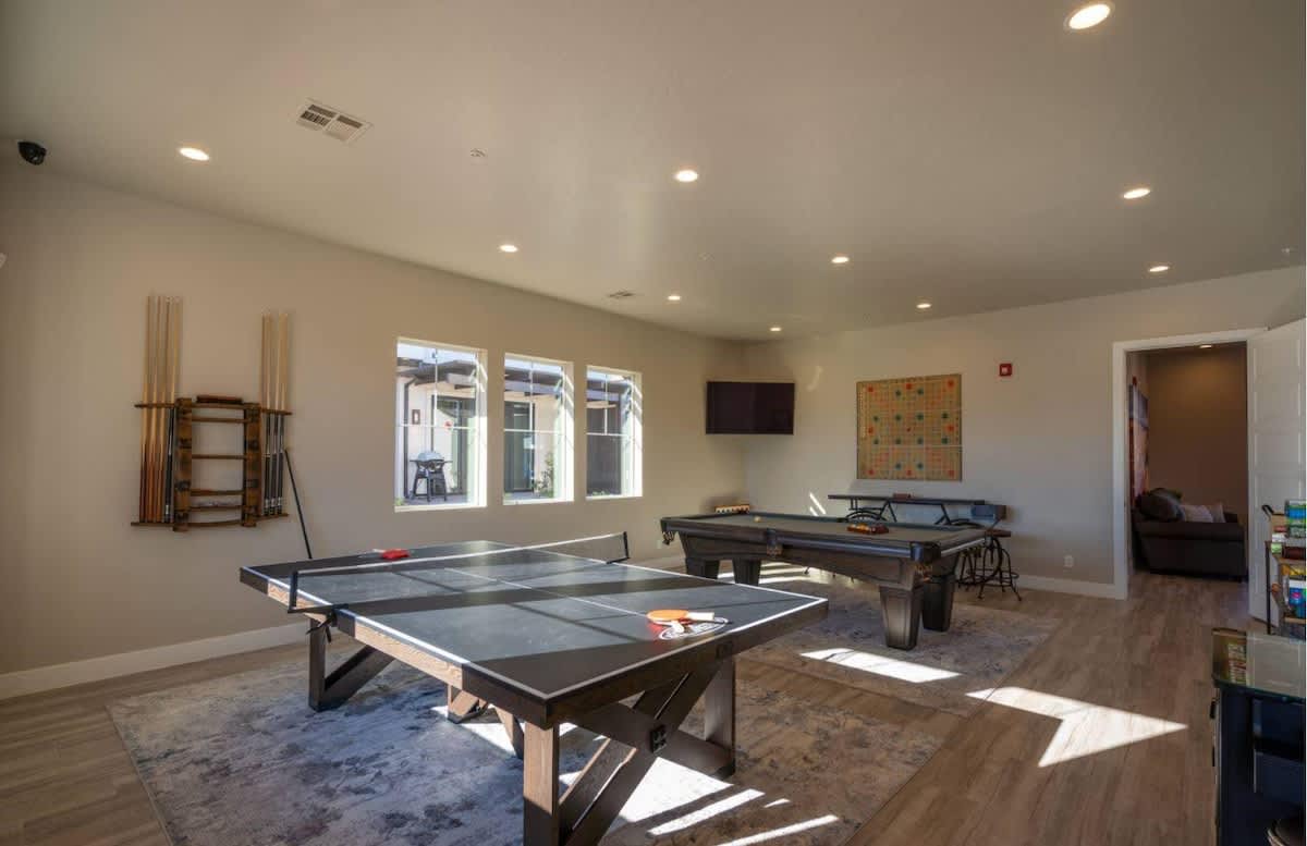 Community kitchen and dining in the poolside clubhouse