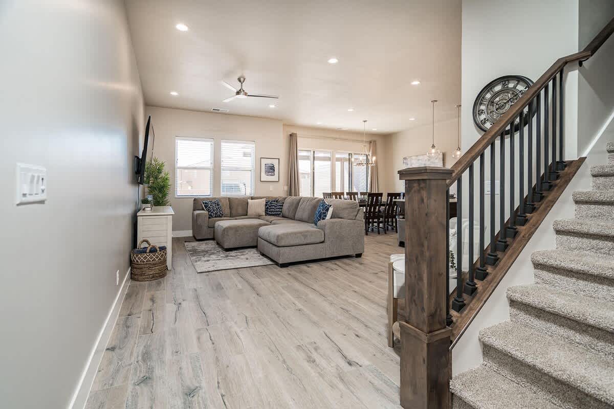 Gorgeous open concept family room and kitchen with sectional
