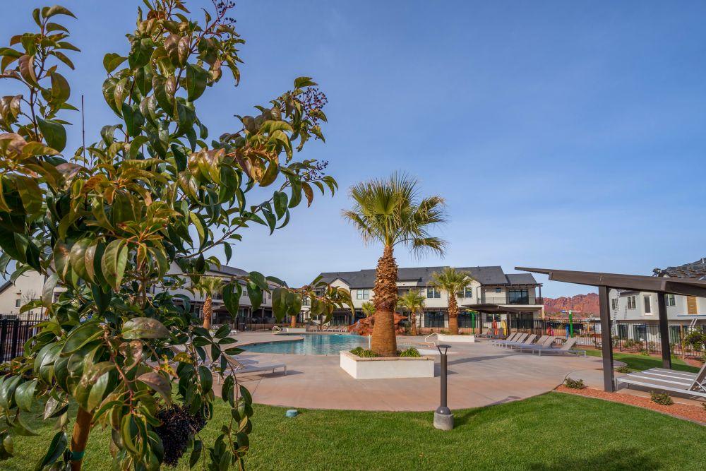 Small poolside grass area