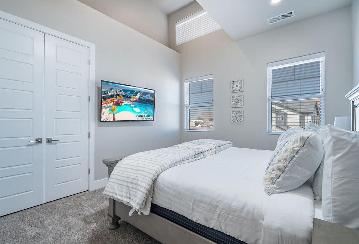 Bedroom 2 with gorgeous bed and TV