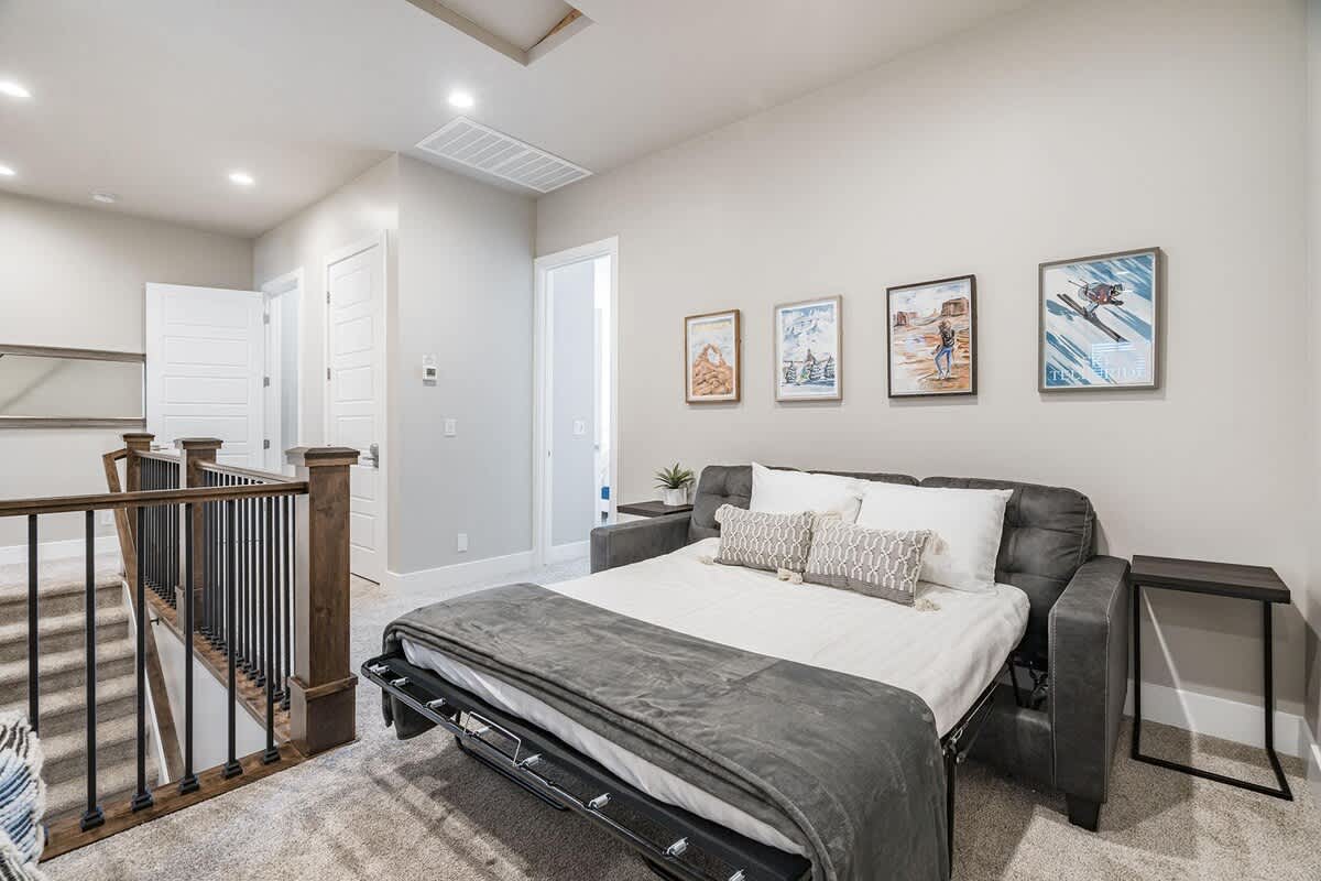 Upstairs family room with sofa sleeper for additional sleeping