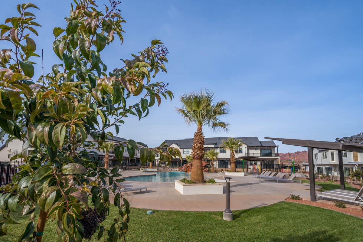 Small poolside grass area