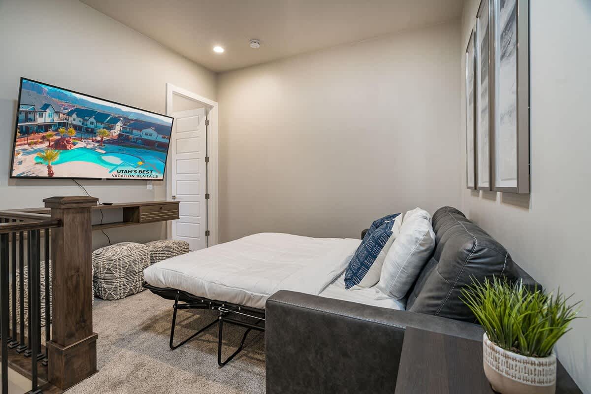 House #50 upstairs family room with sofa sleeper