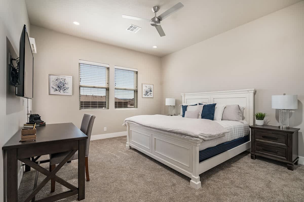 House #50 master bedroom on 2nd level with desk and king bed