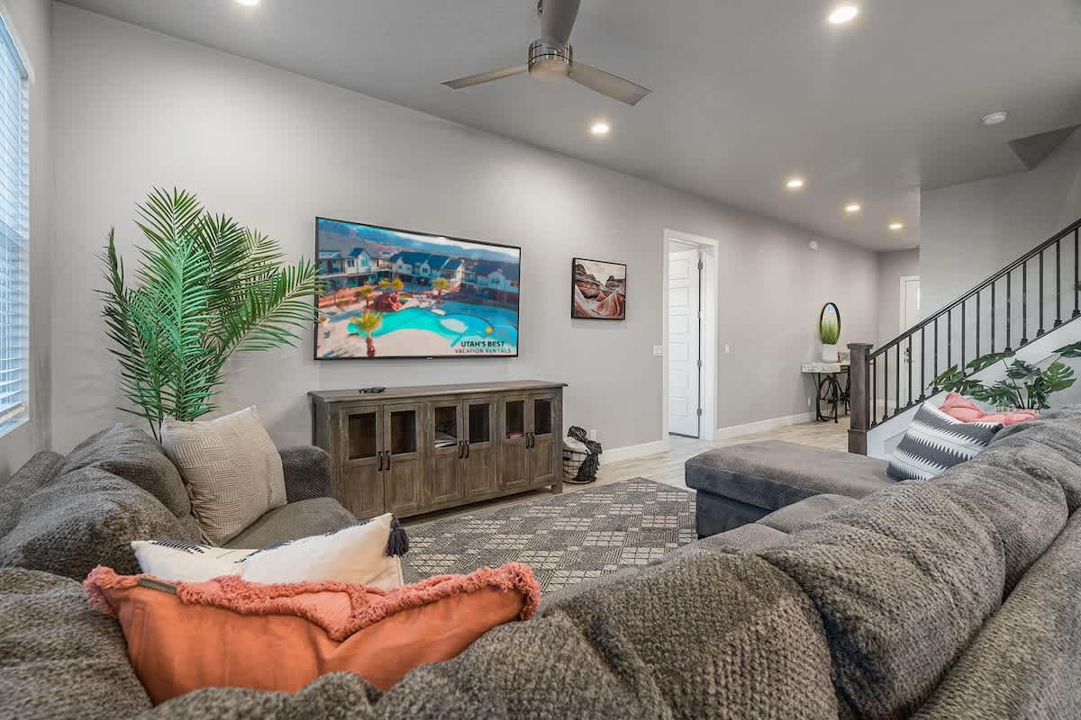 Main floor living room with flat screen TV