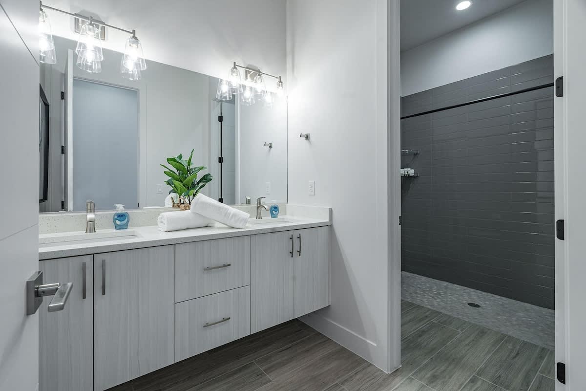 Master bathroom 3 with large shower shared with 2nd bunk room