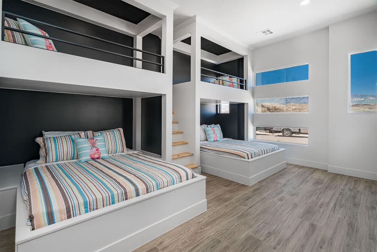 Custom built-in bunk room off main entry sleeps 8 & private bath