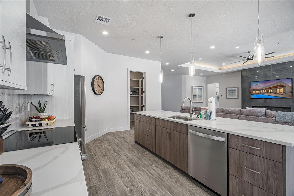 Modern beautiful kitchen opens to large family room