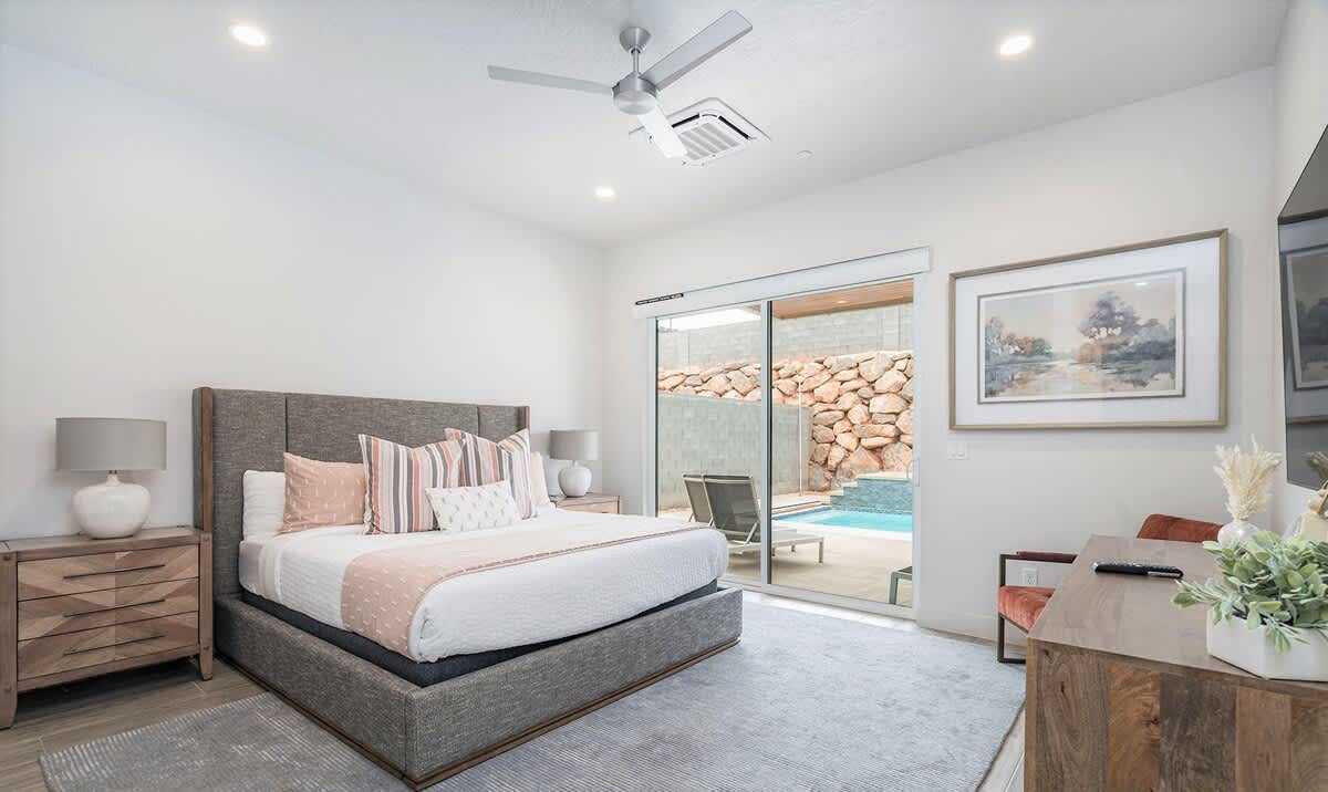 Master bedroom 2 with king bed, private door to pool area