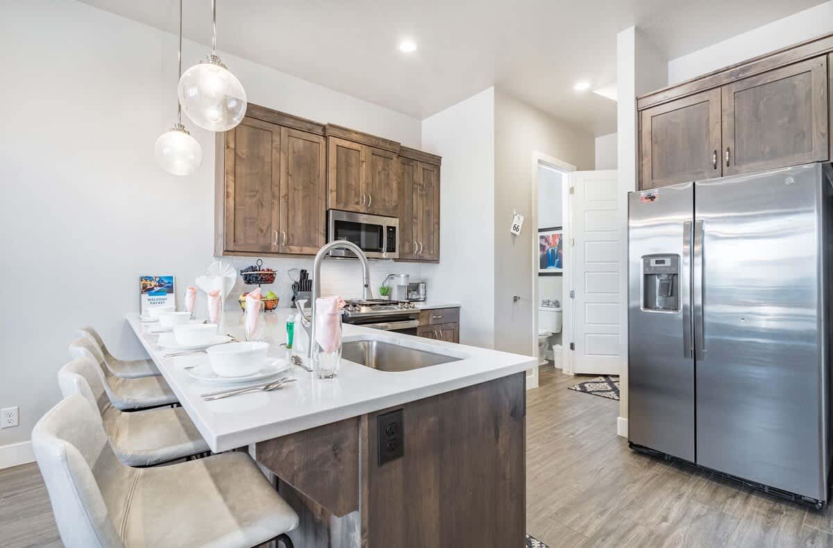 House #66 kitchen with bar seating for 4