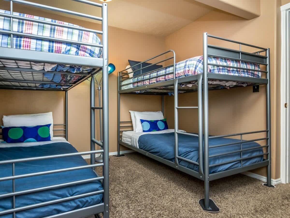 Basement, twin bunk beds with a twin trundle