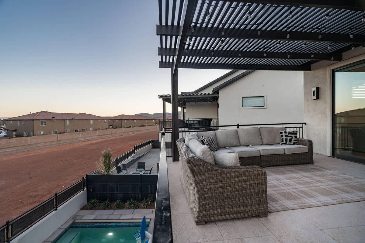 62 - Patio balcony upstairs overlooking pool