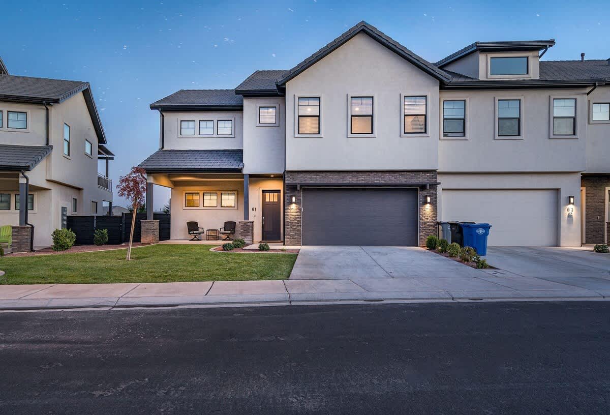 61- Beautiful exterior with 2-car garage and covered porch