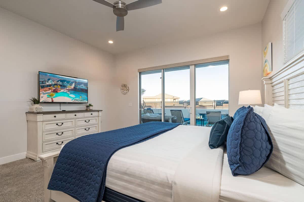 62 - Master bedroom on main level with private pool access