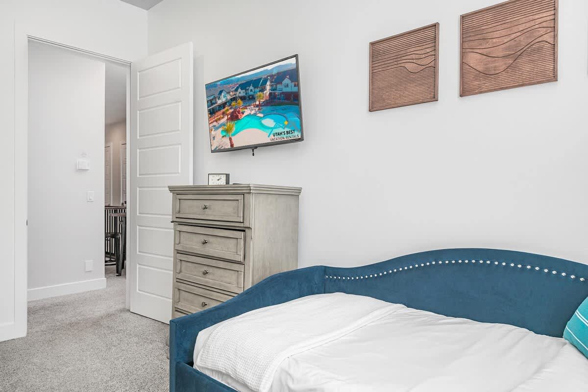 62 - Bunk room with built-in bunk beds and twin day bed with tru