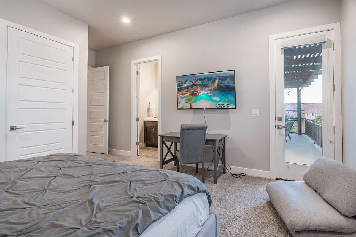 61 - Bedroom 3 with king bed, TV and desk