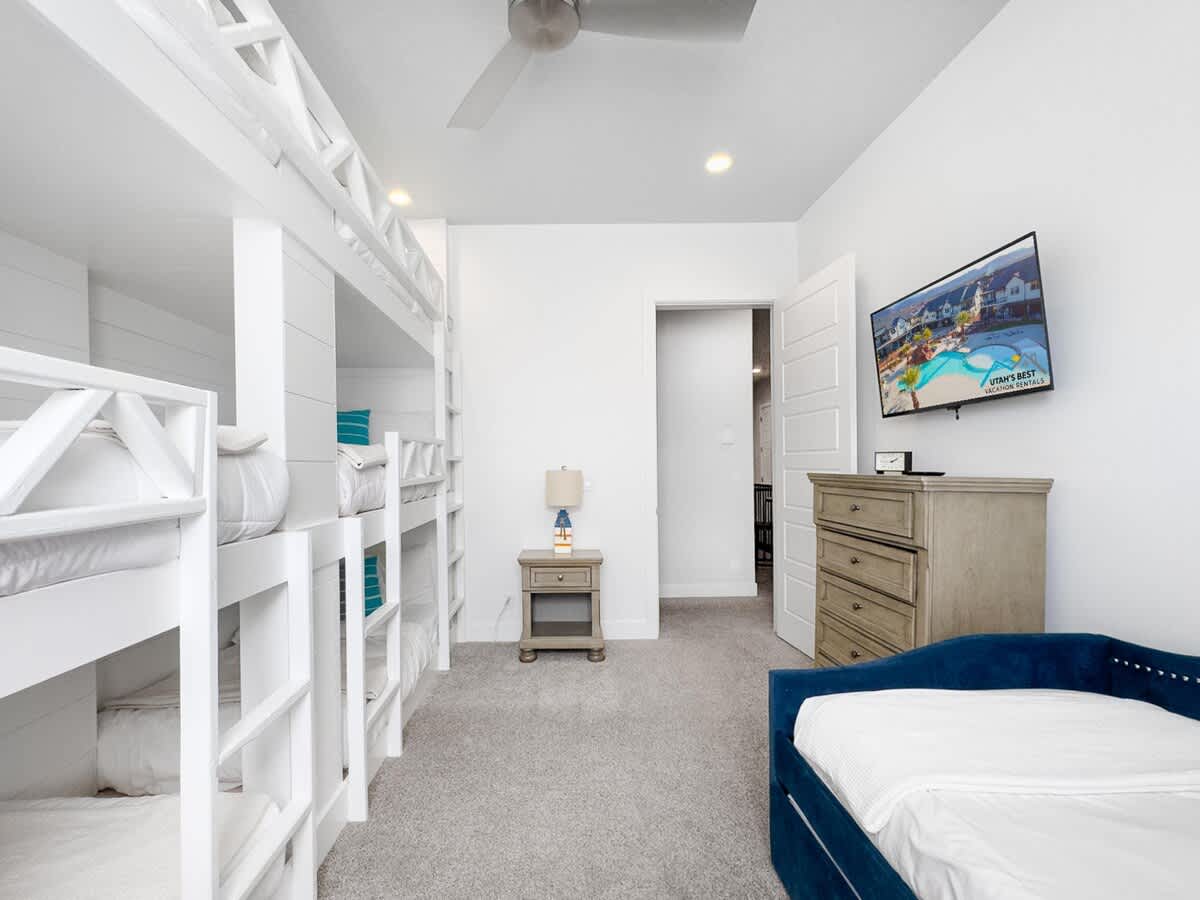62 - Bunk room with built-in bunks and day bed w/ trundle